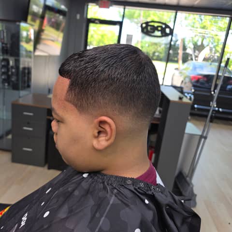 Haircut and grooming work at Legacy Studio Barbershop