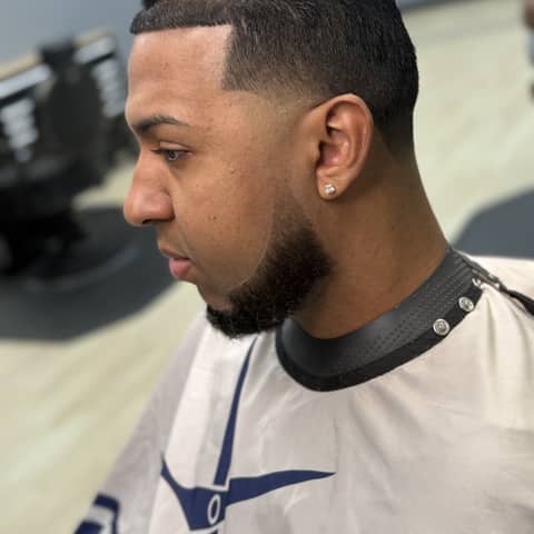 Haircut and grooming work at Legacy Studio Barbershop